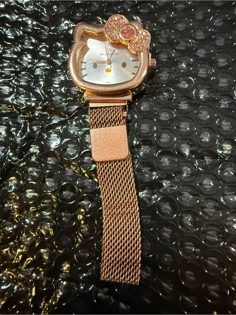 Hello Kitty Rose Gold Tone Mesh Watch with Crystal Bow Accent